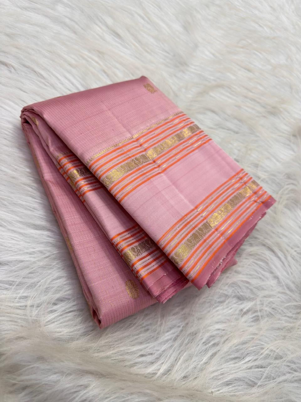 Soft pink Kanchipuram saree with rare Yazhi motifs