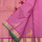 Close view of Kili parrot motif with contrast green meena on orchid pink silk