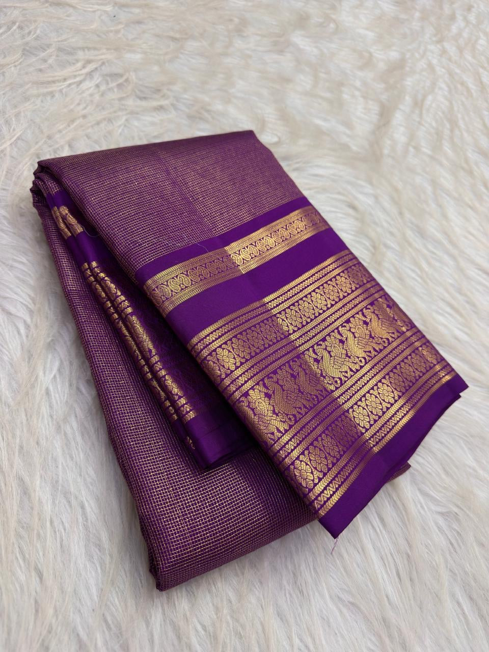 Deep aubergine purple Kanchipuram zari kattam saree, showing body, border and detailed gold zari pallu