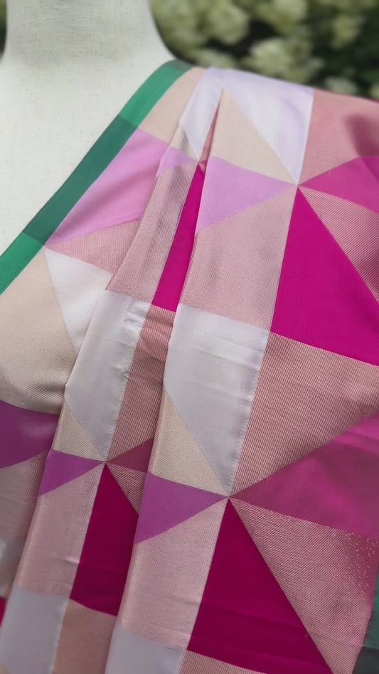 Nila – Ivory, Pastel Pink & Fuchsia Semi-Silk Saree with Geometric Weave.
Paired with a Ready-to-Wear Padded Blouse (Size 36–42)