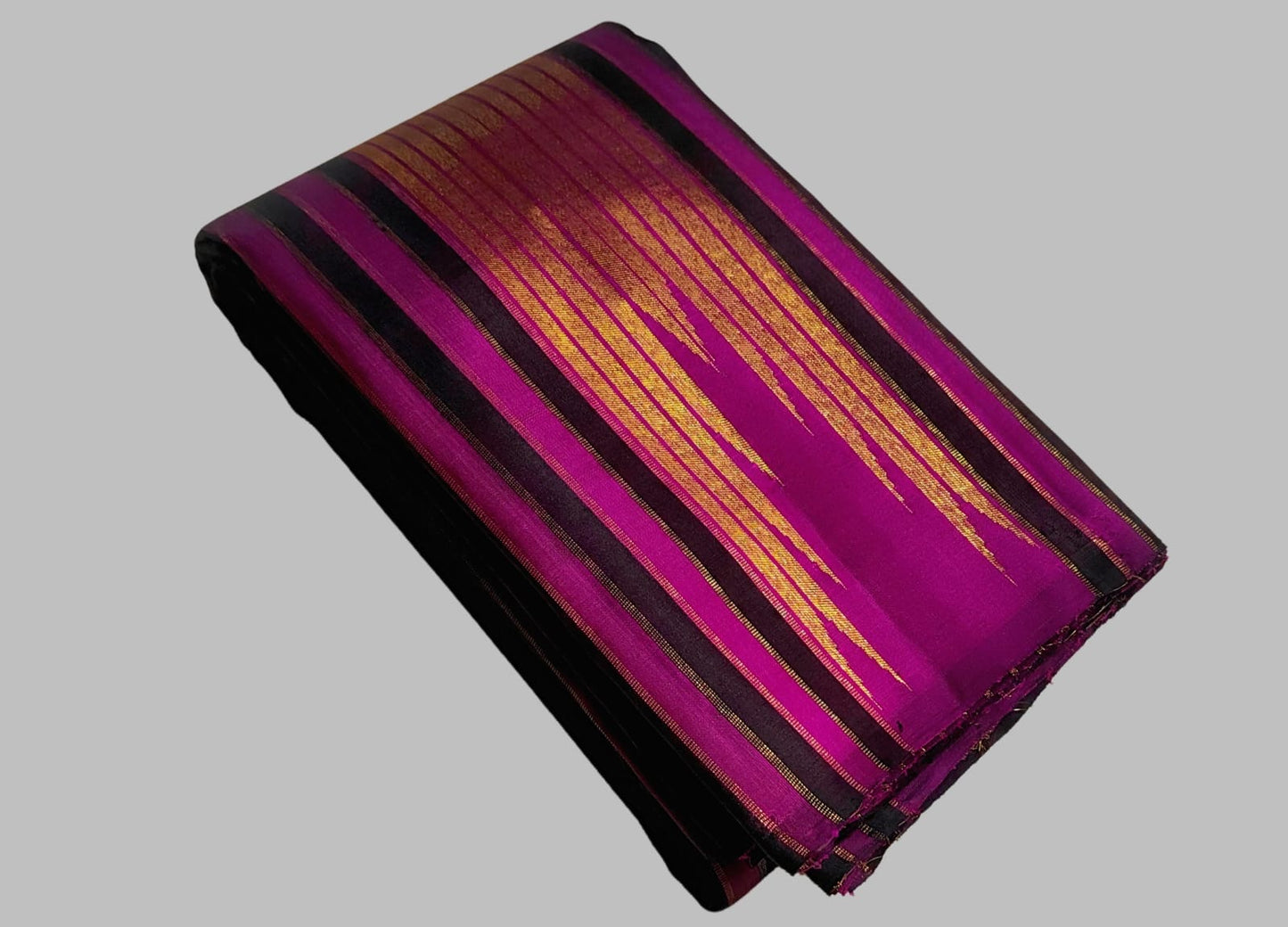 Dark chocolate brown Ettukol Kanjivaram silk saree, folded view