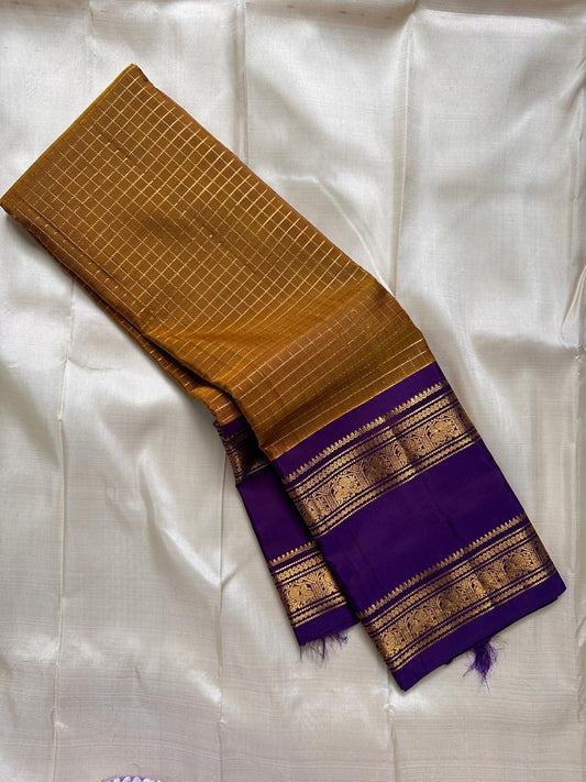 Pure Kanjivaram silk saree with antique gold zari kattam detailing and purple border