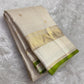 Ivory silk saree with fine zari kattam grid and fresh green border