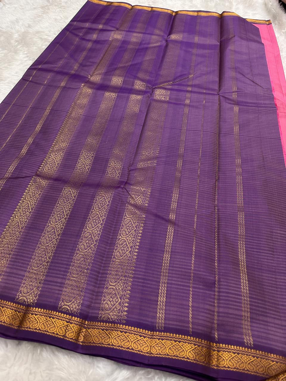 Full deep purple pallu laid flat with zari woven vertical bands and border on Pure Kanchipuram Silk Saree, available in the USA