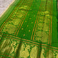 Soft ivory Kanjipuram saree pallu with emerald green zari peacock detailing