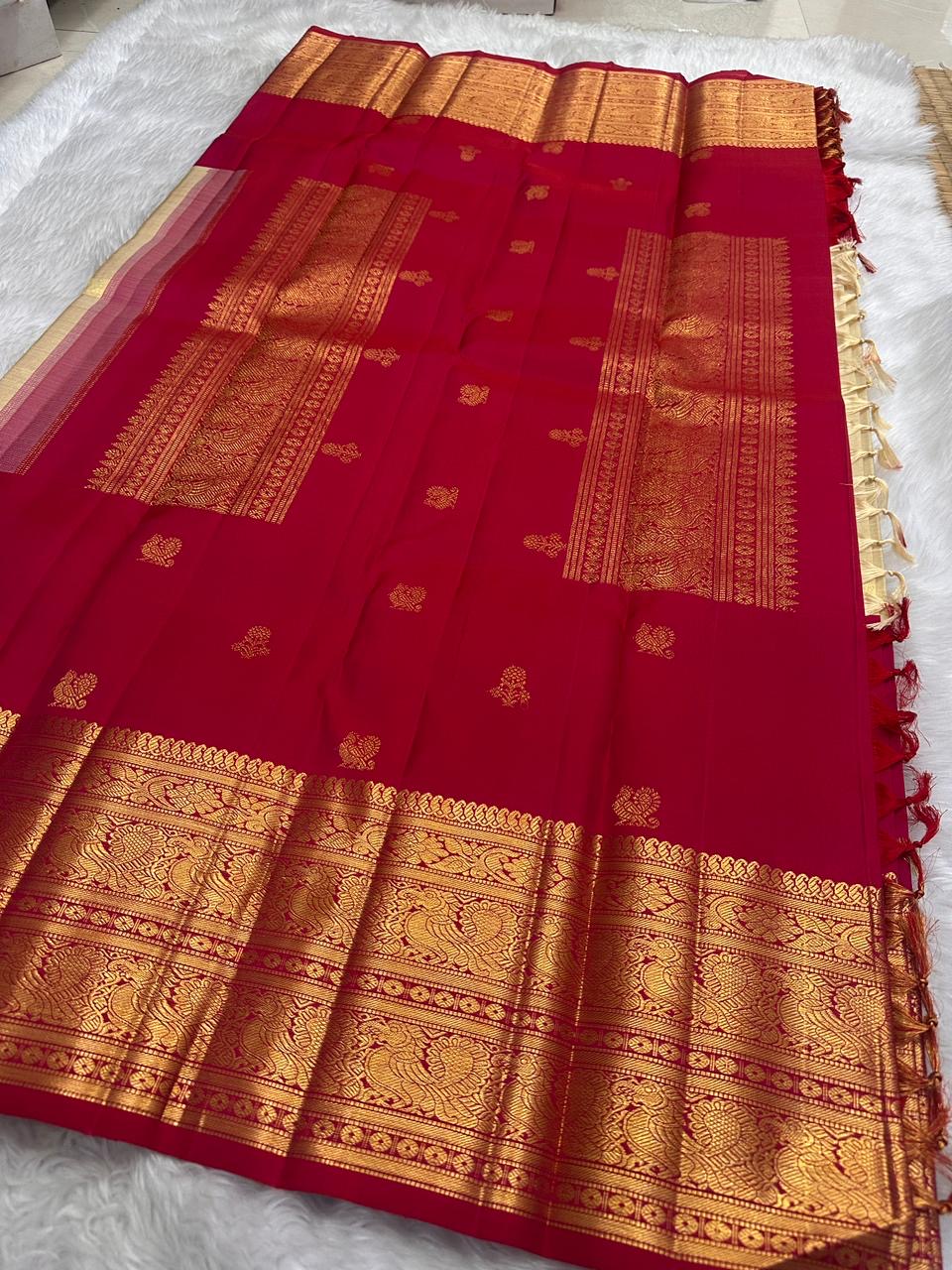 Soft ivory Korvai saree — raspberry pink border detail