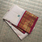 Ivory Kancheepuram Korvai silk saree, floral buttas with Varisaipet zari border and grand pallu