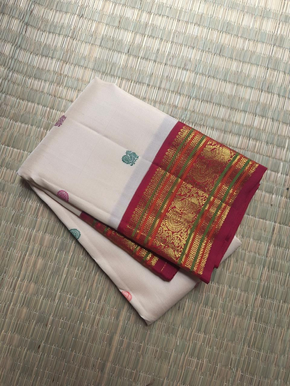 Ivory Kancheepuram Korvai silk saree, floral buttas with Varisaipet zari border and grand pallu