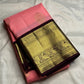 Close-up of mayil peacock zari buttas on blush pink Kanchi Pattu Korvai silk saree body