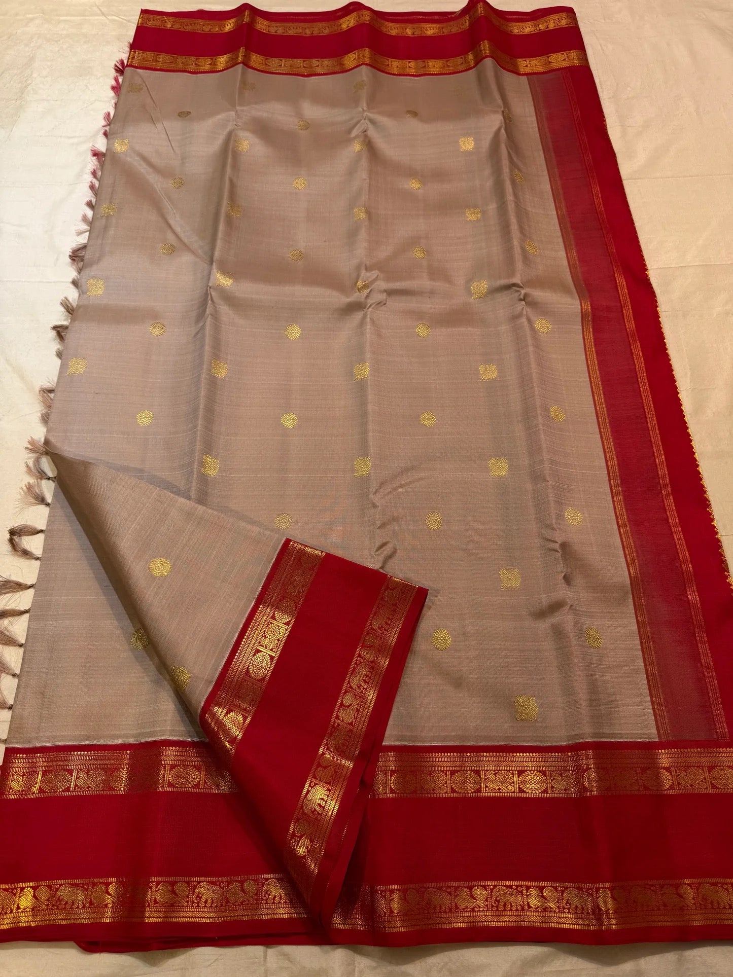Folded Double-Shot Biscuit Beige Kancheepuram Korvai silk saree with Rettapet border pallu