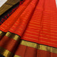 Vermilion Orange Handwoven Pure Silk KanchiPattu Saree with Rettapet Lines and Rust Manthulir Border
