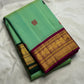 Mint green Kanchi Pattu Butta saree folded view — Idam Living
