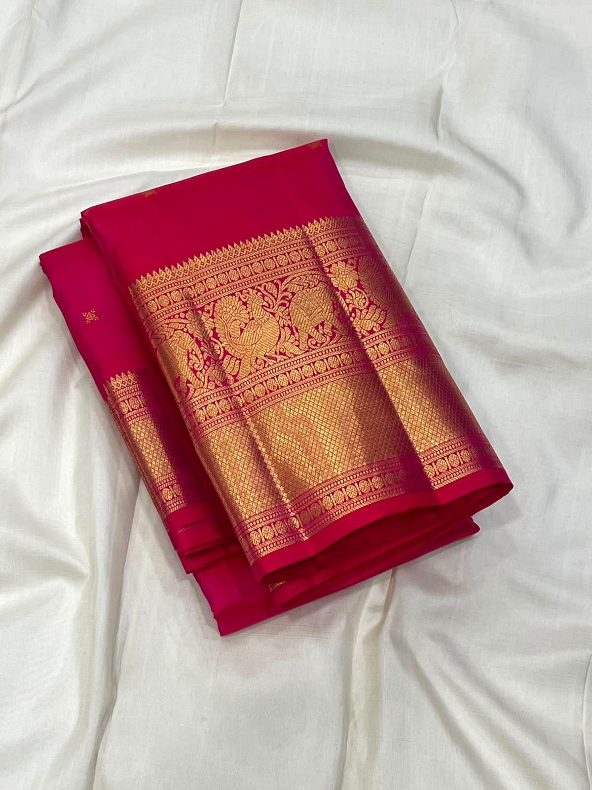 Pure Kanchipuram silk Butta Raspberry Pink saree folded, Silk Mark certified, handwoven in Kunnam village