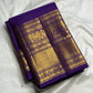 Restrained body close-up of royal purple Kanjipuram Butta saree