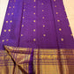 Elephant and peacock zari border detail on royal purple Kanjipuram saree