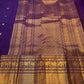Zari motif detail close-up on royal purple Kanjipuram Butta saree