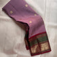 Close-up of antique gold zari Butta motifs on dusty lavender Kanchi Pattu silk saree