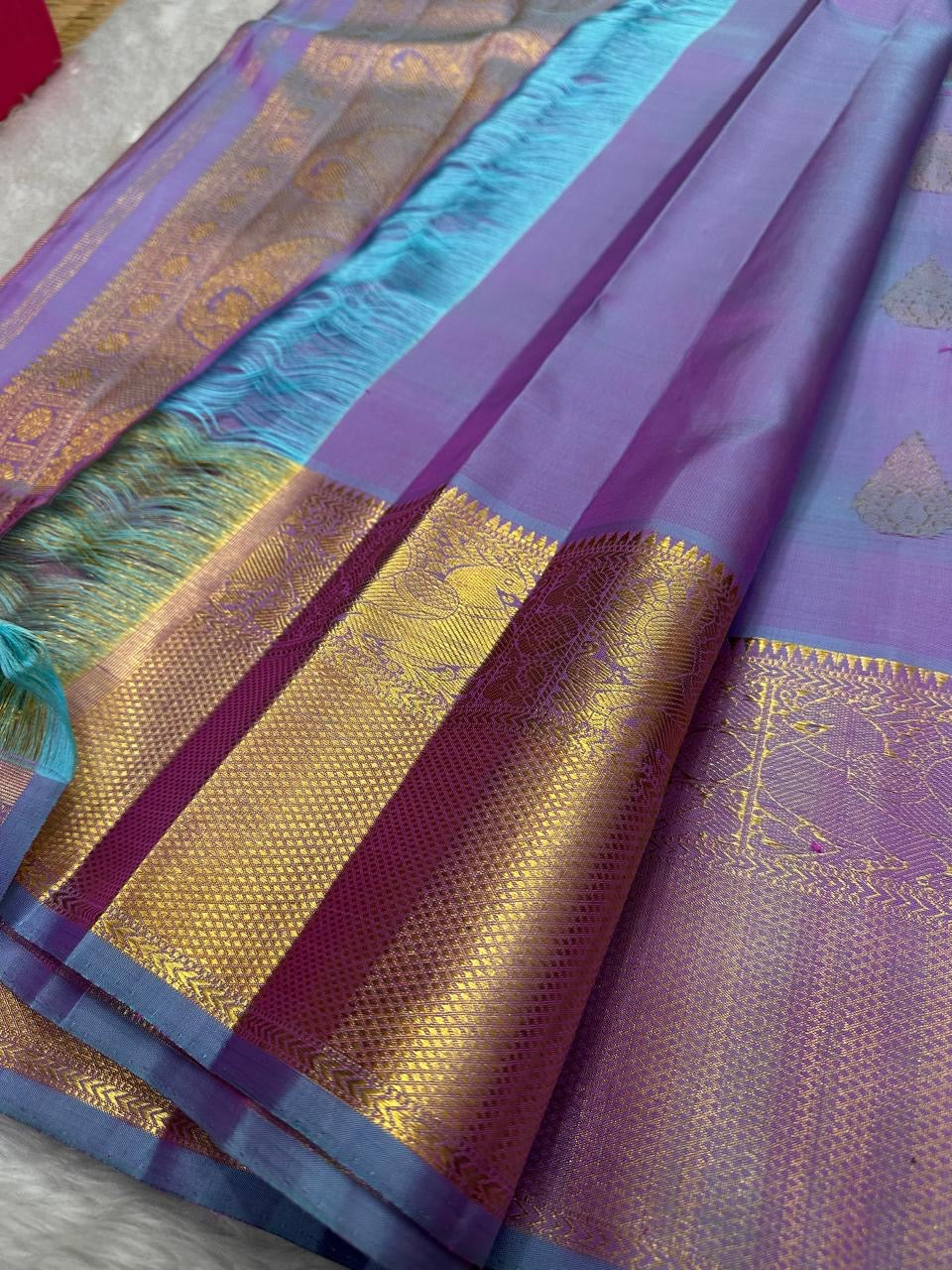 Pure Silk Kanchipuram saree showing double-shot Butta weave detail