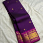 Body close-up of royal purple Kanjipuram saree showing petite gold zari buttas
