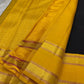 Handwoven Kanchipuram silk saree in navy with classic gold zari detailing and contrast pink pallu
