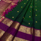 Pallu detail of deep forest green Kanjeevaram Rettapet saree with matching zari work