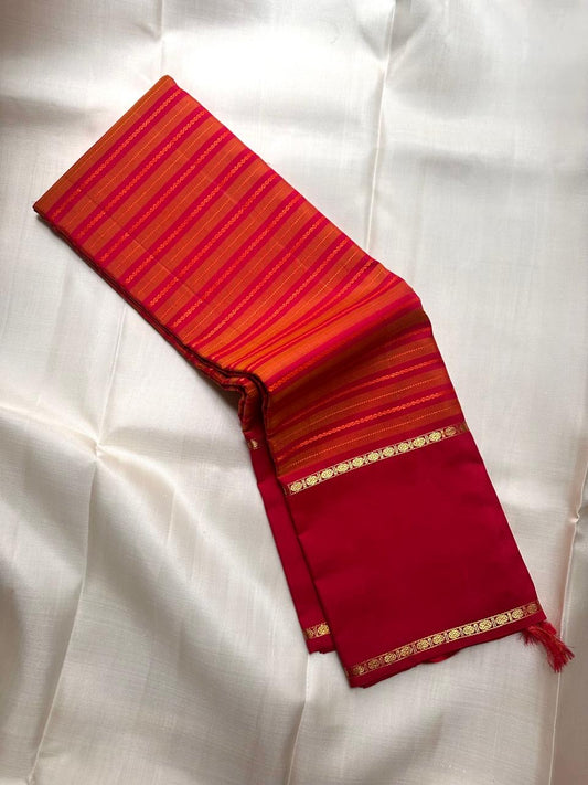 Turmeric Gold Handwoven Pure Silk Kanjipuram Saree with Rettapet Raspberry Pink Border