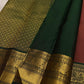 Burnished Brick pure silk Kancheepuram saree, Butta weave with Deep Green border — body weave close-up