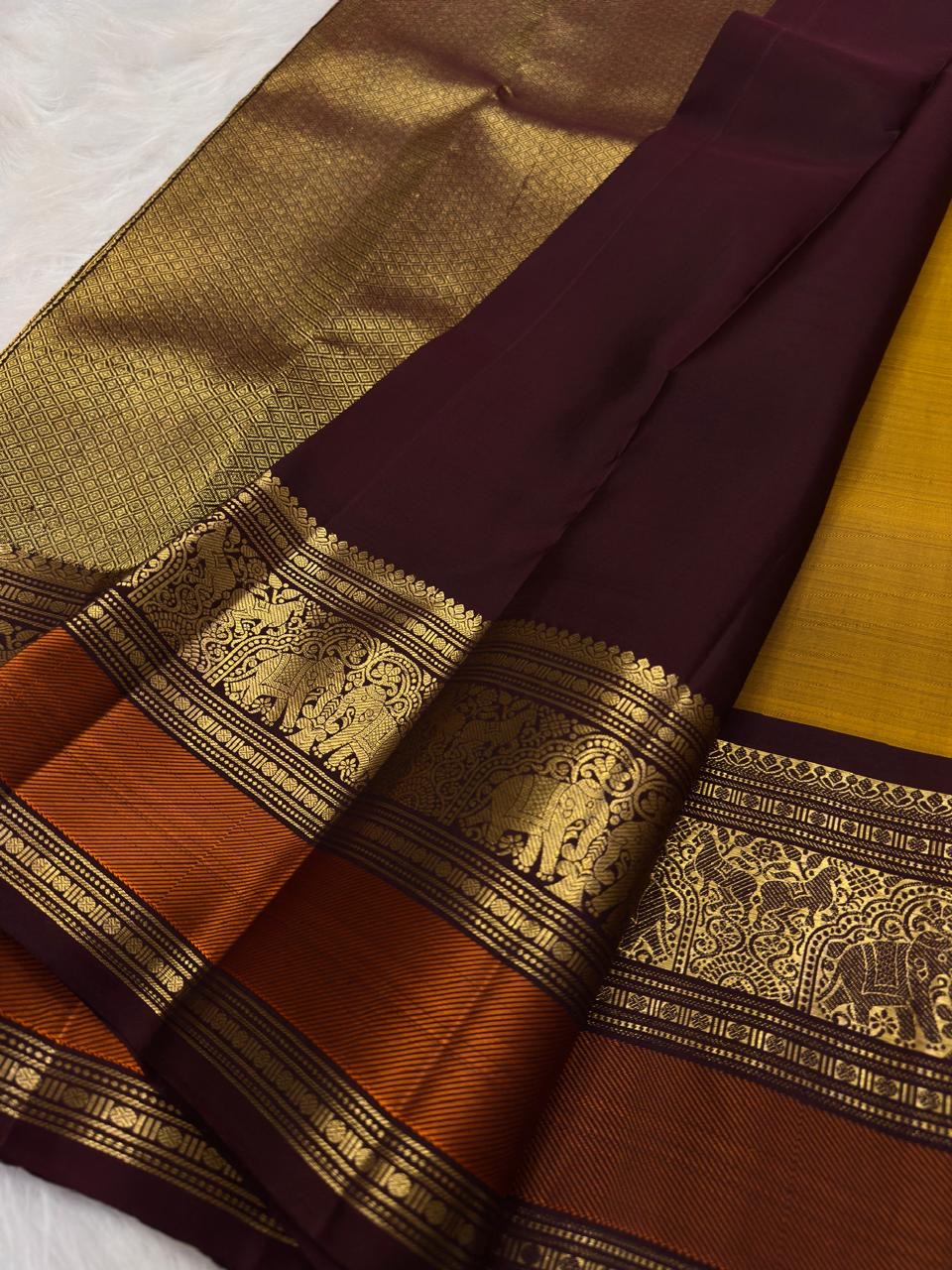 Golden Turmeric pure silk Kanchipuram saree, Butta weave with Deep Aubergine border — border detail