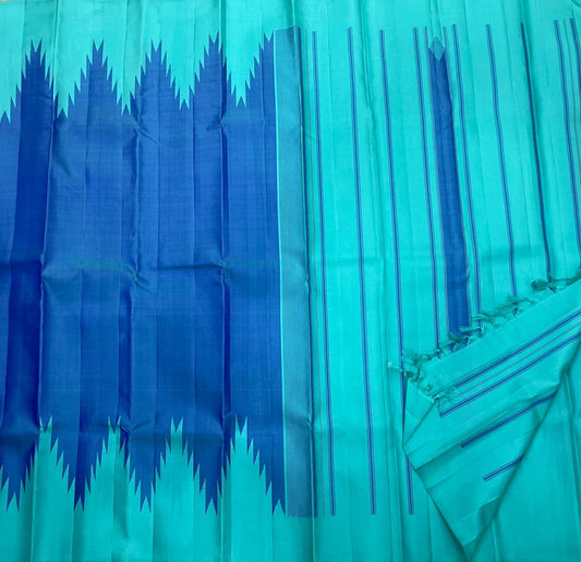 Handwoven Kanchipuram silk saree with cerulean blue body and contrasting deep blue thazhampoo reku temple edge border