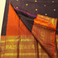 Hand woven Kanchipuram silk saree with dark cocoa purple body and zari motifs