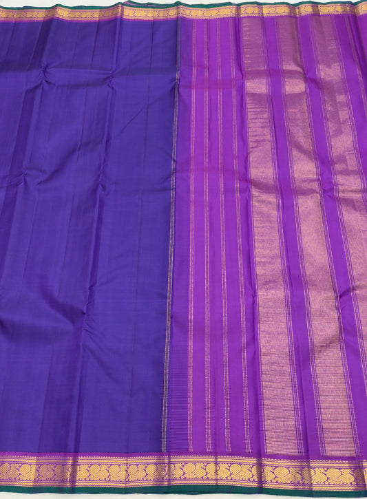 Pure Kanchipuram silk saree with magenta mayil adai korvai border – pallu detail