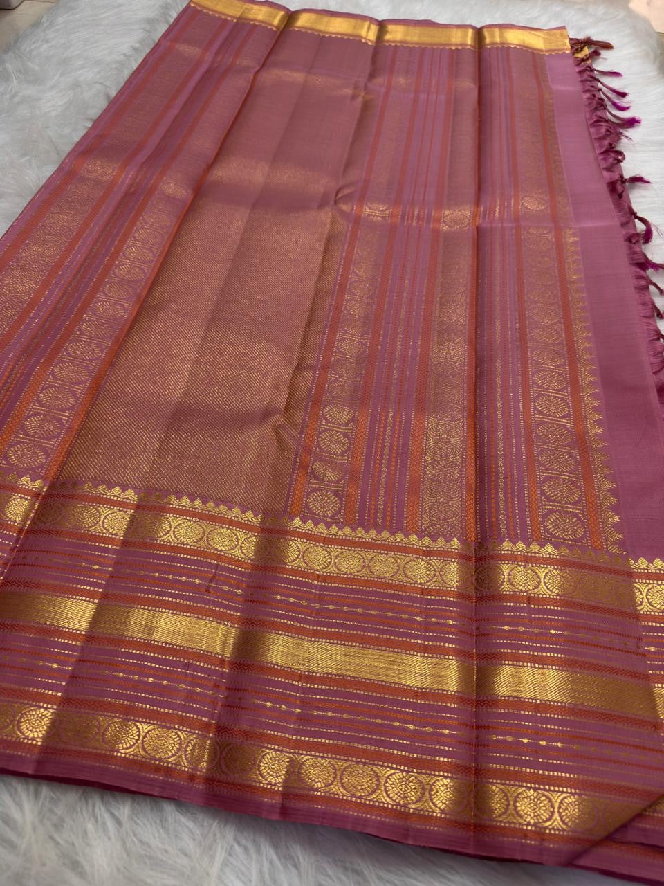 Regal Peacocks on Throne motif woven in antique gold zari, Kanchi Pattu silk