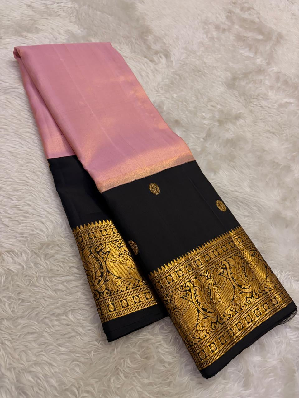Close view of kanchana purple Kancheepuram silk saree with deep brown korvai and antique gold zari
