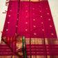 Emerald selvedge Kanjivaram saree with antique gold woven zari work.