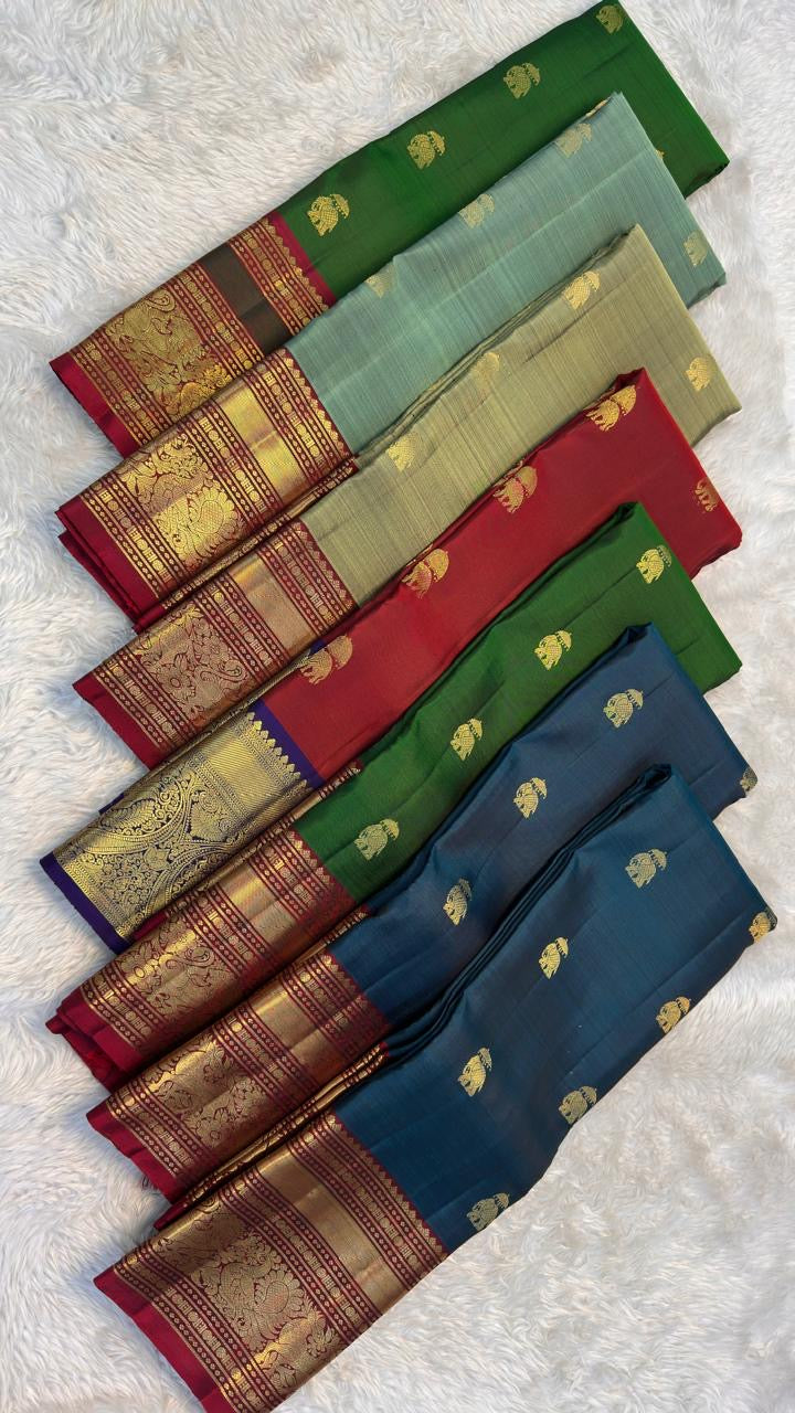 Pure Kanchipuram silk saree sage green with burgundy red korvai border – full length view