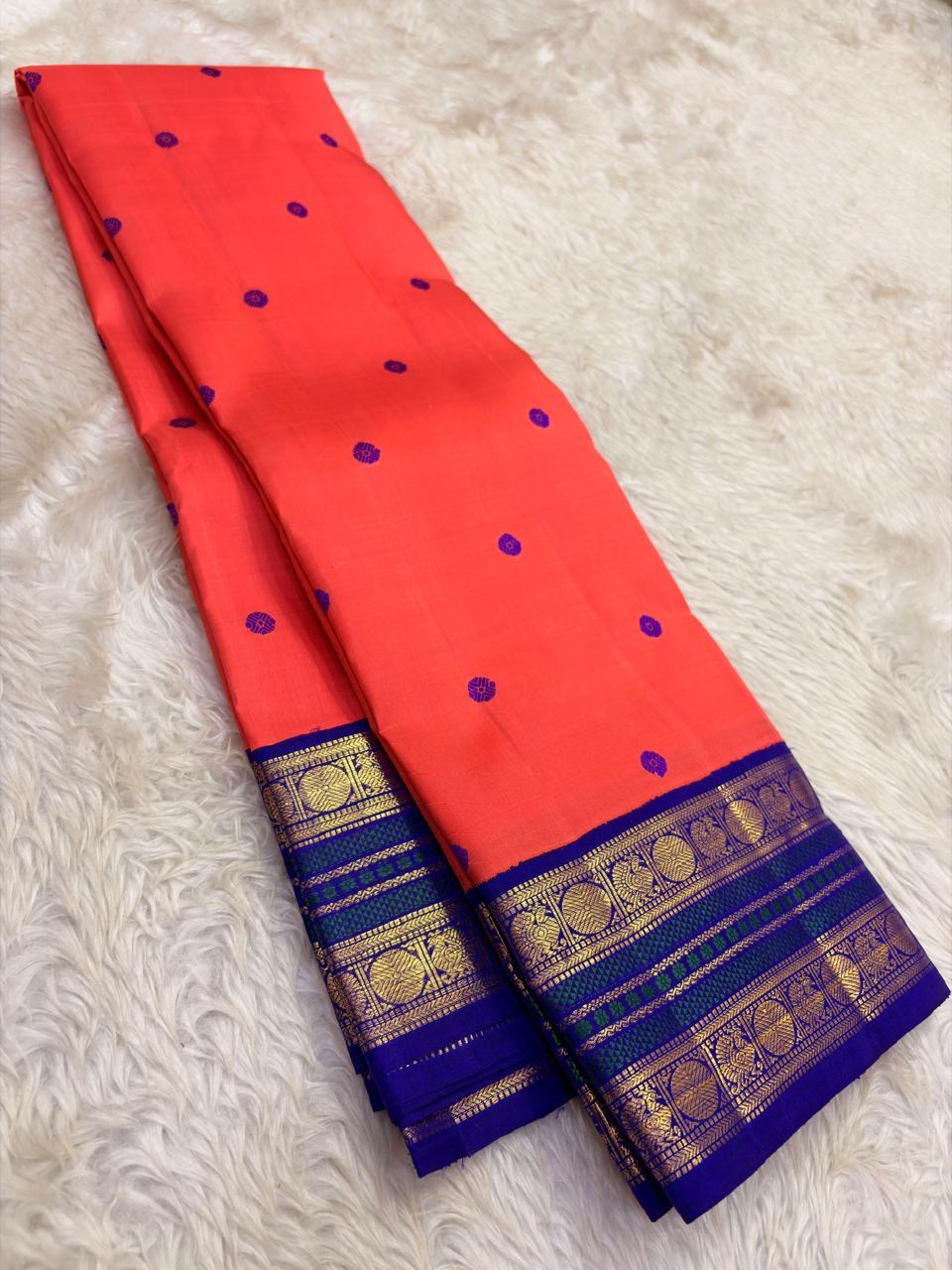Pure Kanchipuram silk saree with silk thread butta in coral orange – body weave detail