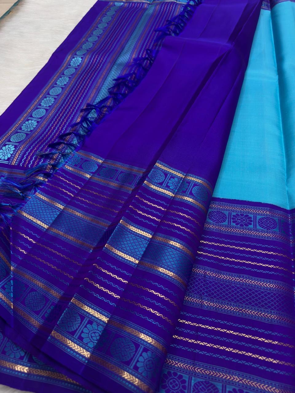 Turquoise Blue pure silk Kanchi Pattu saree, Varisaipet weave with Royal Purple border — pallu detail