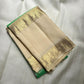Pallu detail of fresh green Kancheepuram Zari Kattam saree in ivory-gold