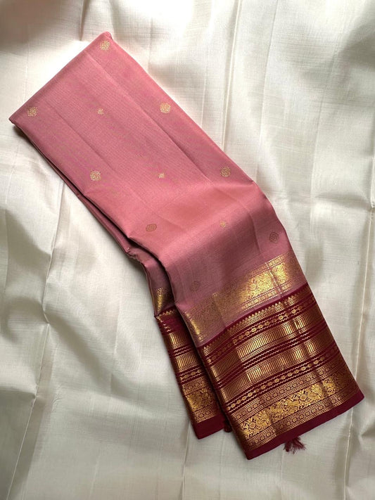 Dusty rose handwoven pure silk Kanchi Pattu saree with deep maroon Varisaipet border, full view