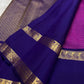 Royal purple Rettapet border detail with antique-gold zari paisley motifs on raspberry pink Kanjivaram saree