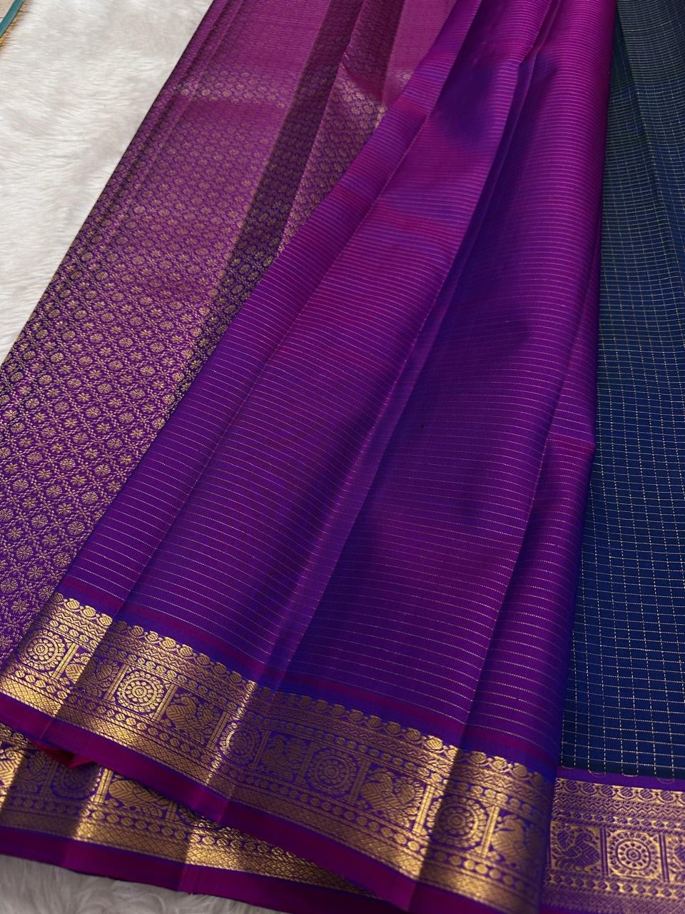 Pure silk Kancheepuram saree in ink blue with royal orchid purple border