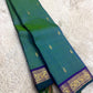 Blue green Kanjivaram silk saree with traditional antique gold grid detailing