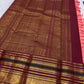 Aubergine Korvai elephant motif detail on Coral Peach Kanchi Pattu silk saree