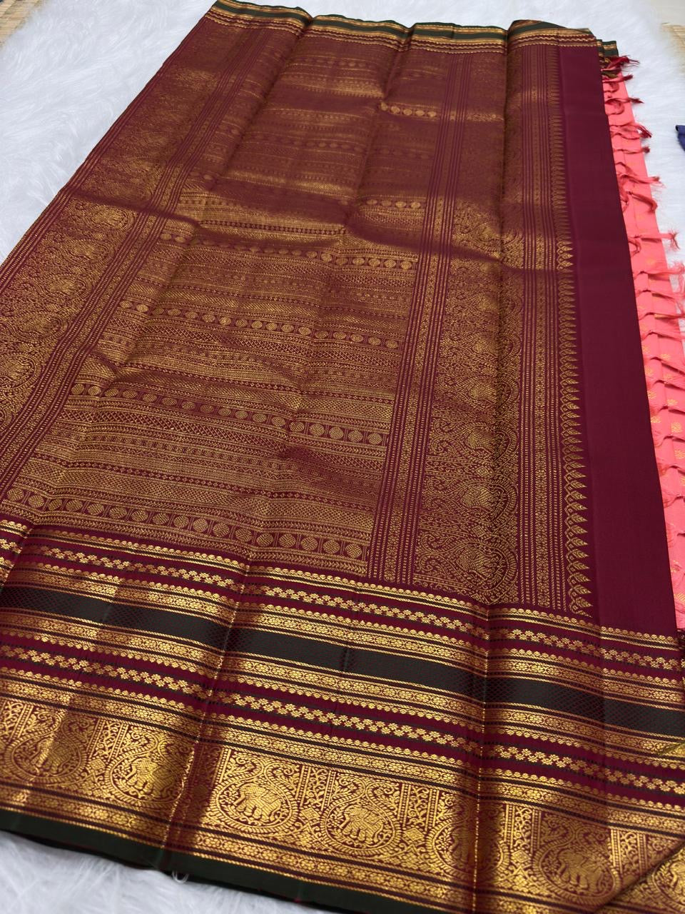 Aubergine Korvai elephant motif detail on Coral Peach Kanchi Pattu silk saree