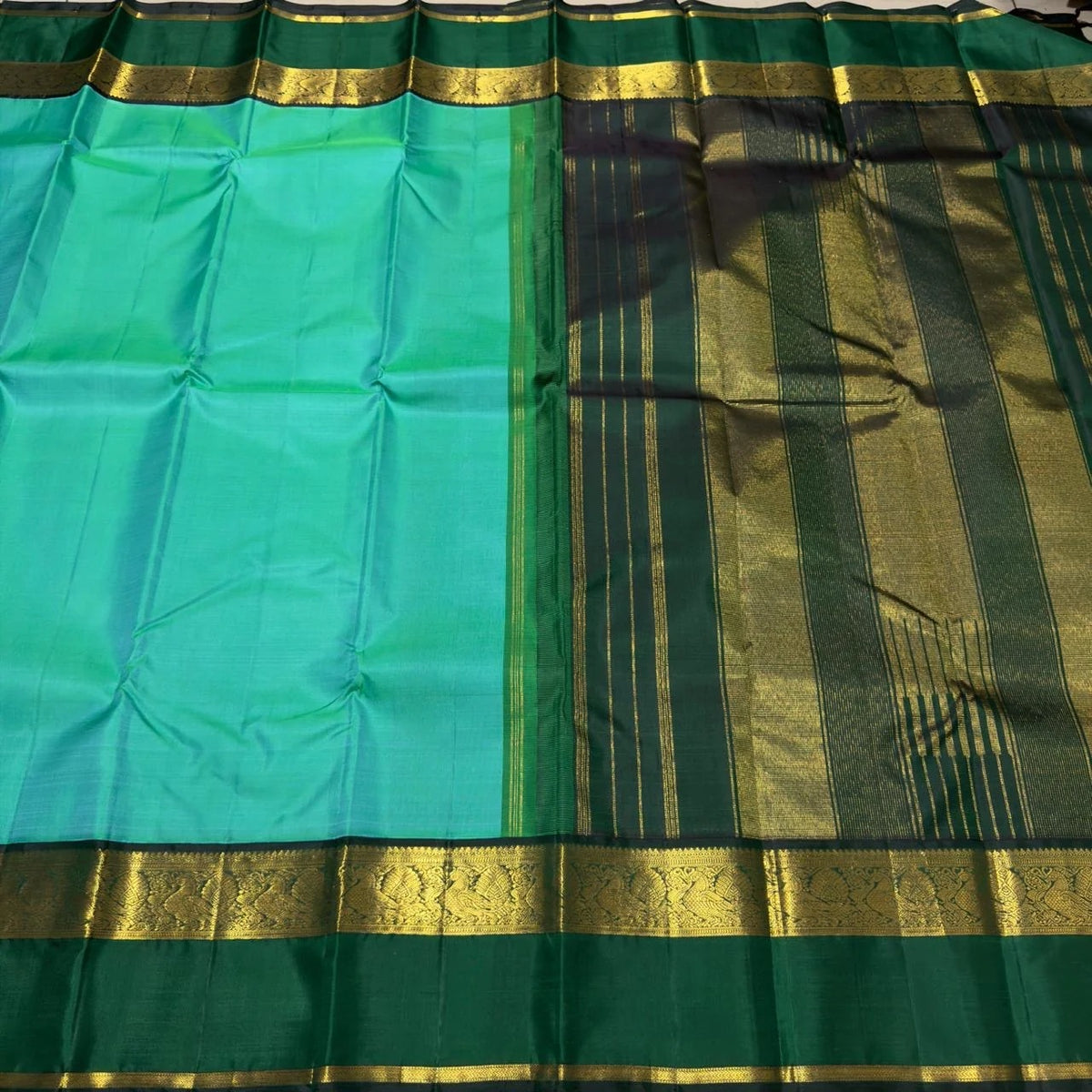 Light Green Handwoven Korvai Kanjivaram Silk Saree with Bottle Green Border