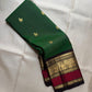 Deep Forest Green pure silk Kanjipuram saree, Butta weave with Deep Aubergine border — folded view
