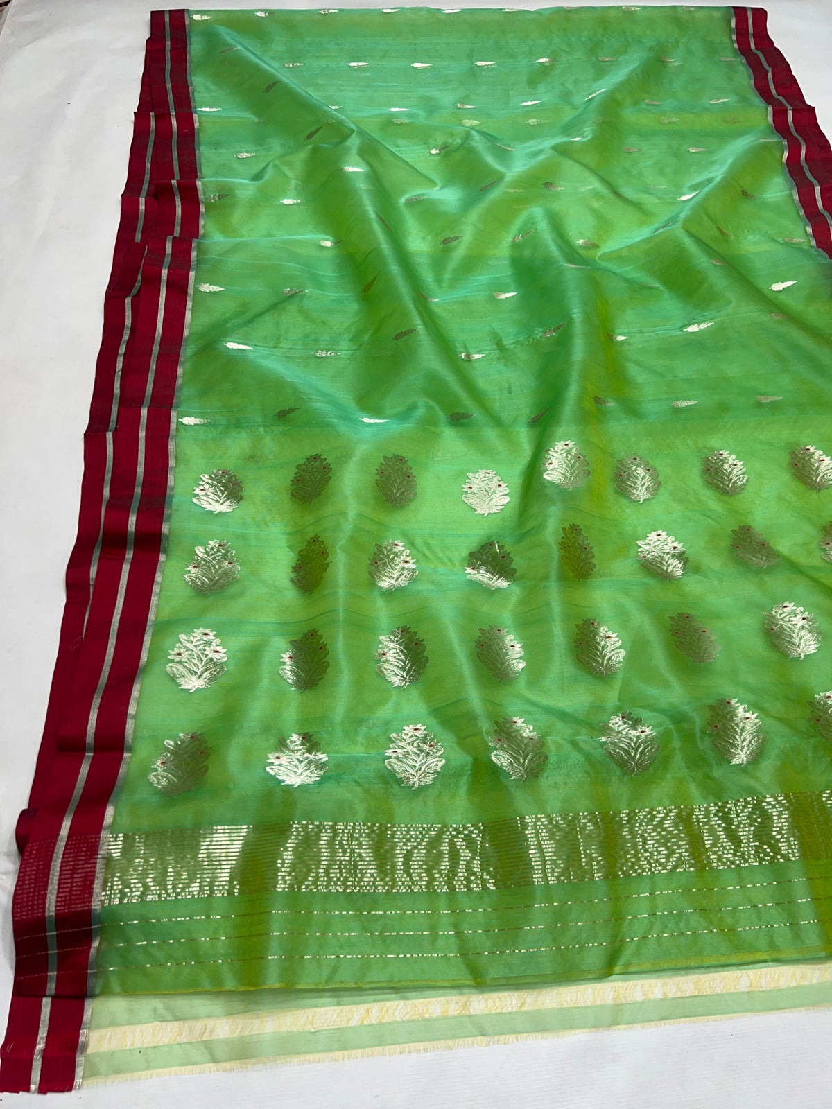 Pure Silk Chanderi green saree with deep-red border