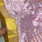 Pure Silk Chanderi saree showing metallic floral lattice on pink body