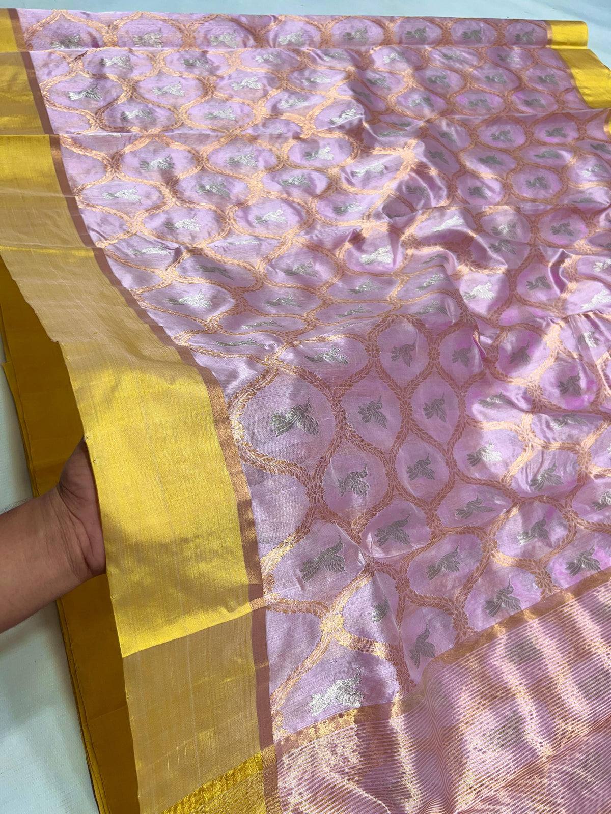 Pure Silk Chanderi saree showing metallic floral lattice on pink body
