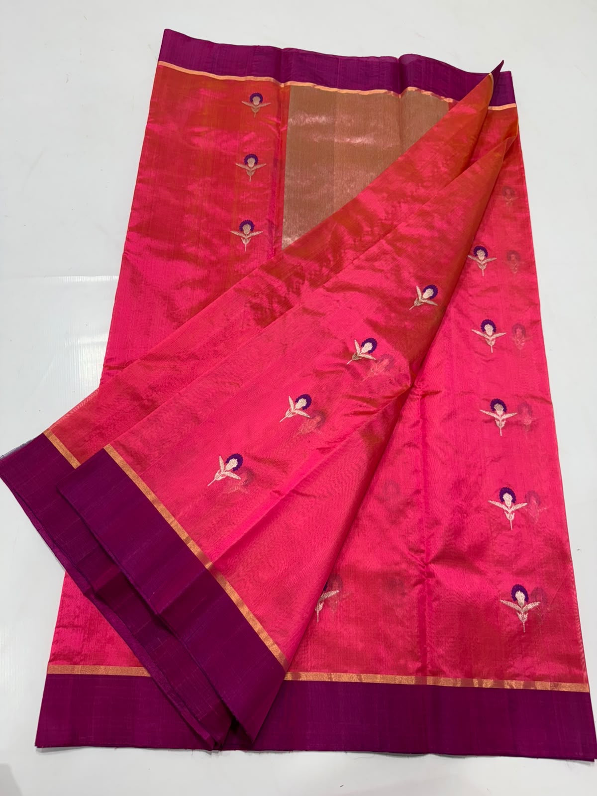Pure Silk Chanderi saree with Rani pink body and floral motifs